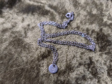 Load image into Gallery viewer, Taurus hand-stamped stainless steel necklace from the Astrology collection