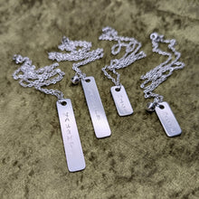 Load image into Gallery viewer, Naughty and Nice Metal Stamped Necklaces
